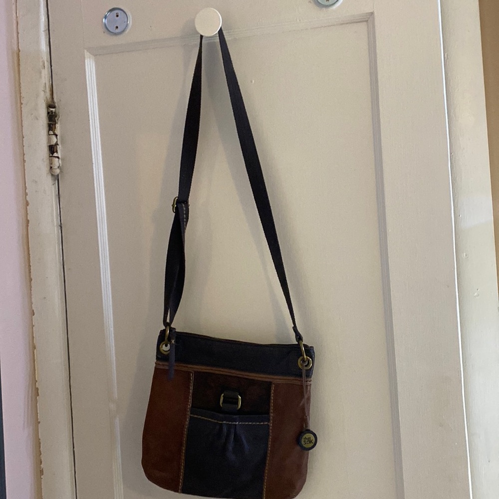 The Sak brown leather purse.